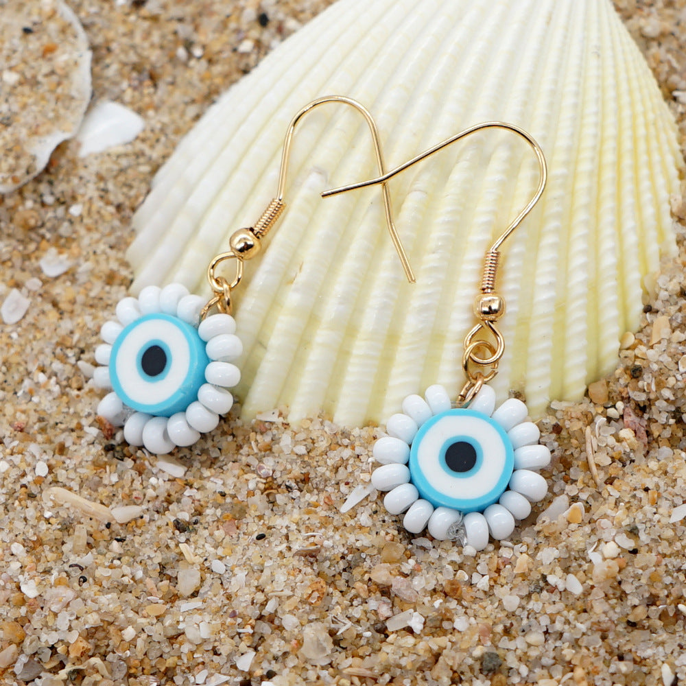 Joyas al por mayor Pendientes de perlas ahumadas con ojos de girasol